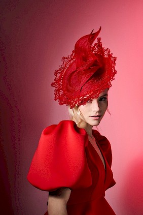 Red fascinator hat